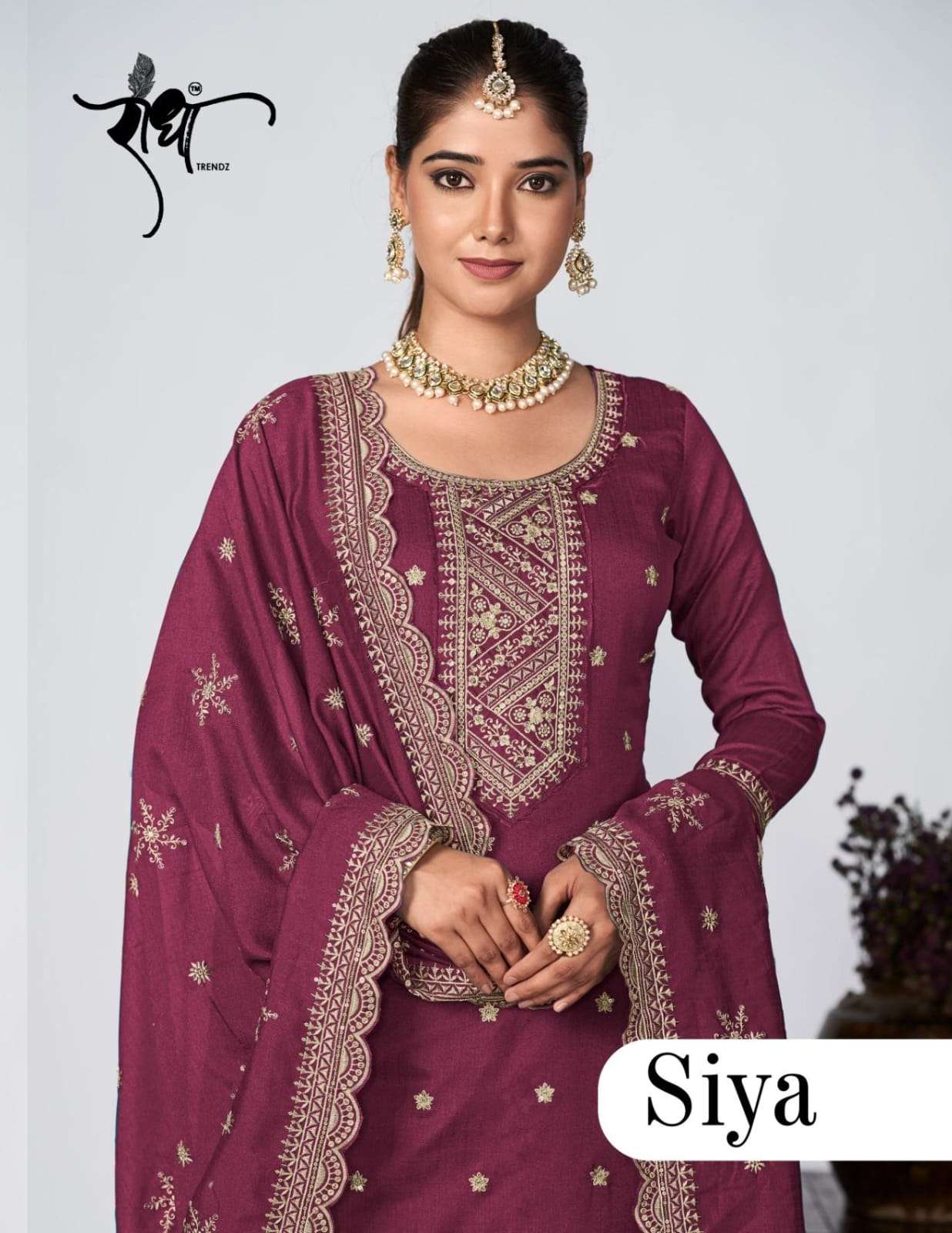 RADHA TRENDZ  SIYA EMBROIDERY WORKS SILK SUIT