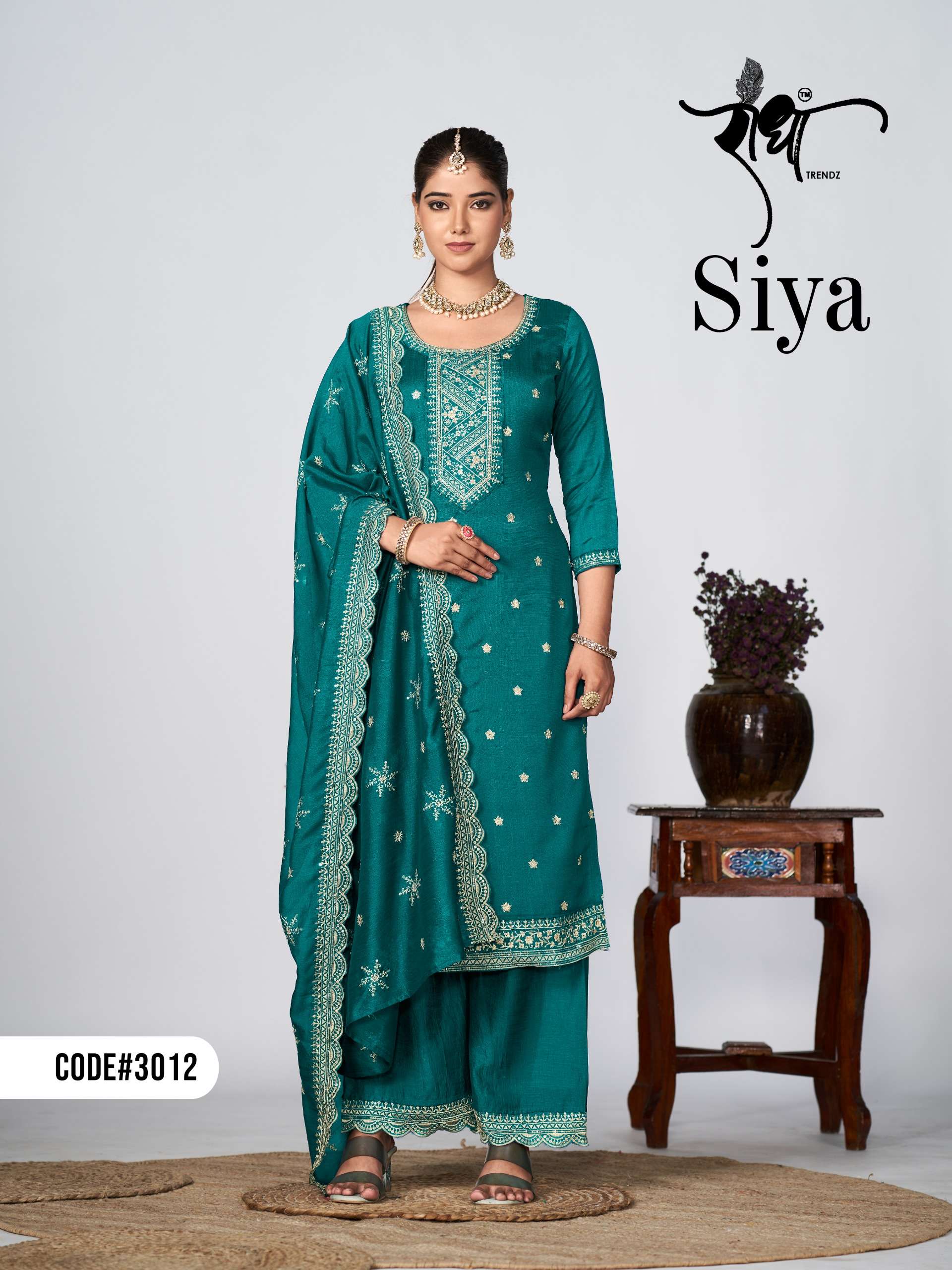 RADHA TRENDZ  SIYA EMBROIDERY WORKS SILK SUIT