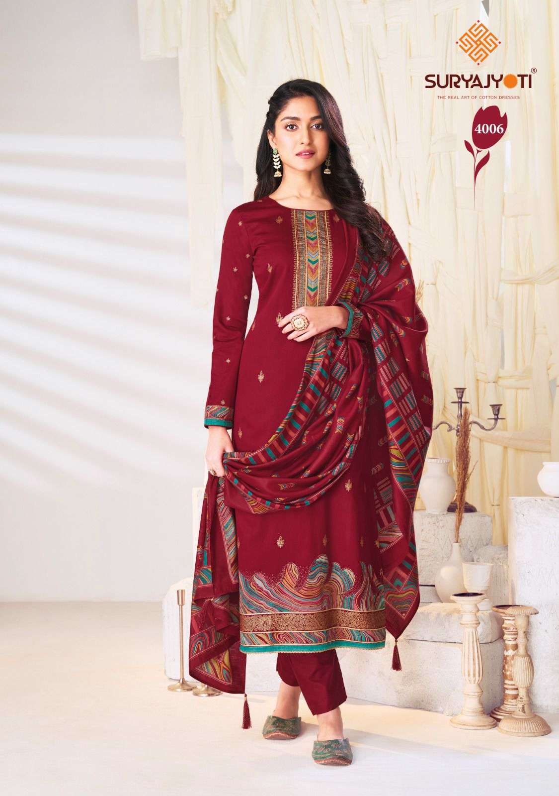  SURYAJYOTI PALLAVI VOL 4 JAM SATIN PRINT WITH FANCY SWAROVSKI WORK SUIT