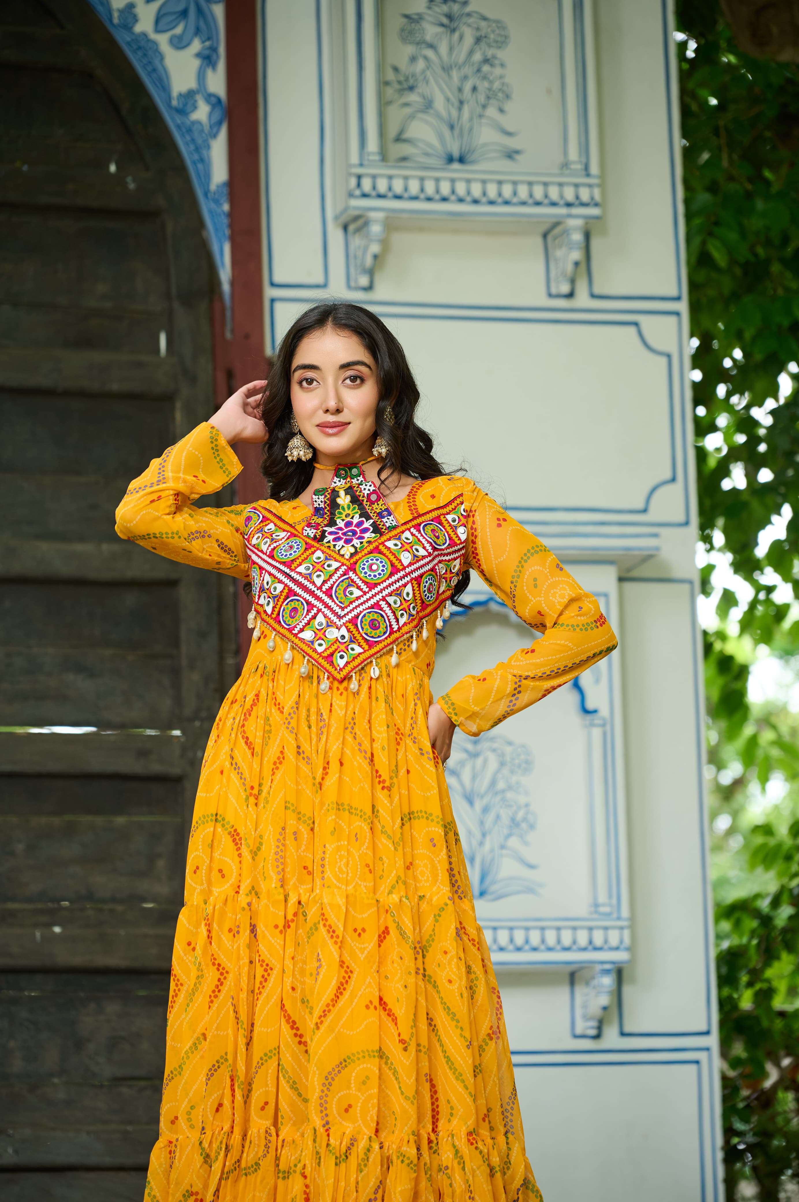 KA 1194 GEORGETTE BANDHANI PRINT WITH MIRROR WORK NAVRATRI WEAR LADIES GOWNS 